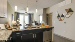 Kitchen Living Room at Routh Street Flats Apartments in Dallas TX Lux Locators Dallas Apartment Locators