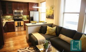 Living Room Kitchen at Gables Uptown Trail Apartments in Dallas TX Lux Locators Dallas Apartment Locators