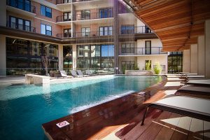 Pool Lounge at The Taylor Apartments in Uptown Dallas TX Lux Locators Dallas Apartment Locators
