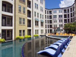 Pool Lounges at The Monterey by Windsor Apartments in Uptown Dallas TX Lux Locators Dallas Apartment Locators